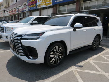Lexus  LX  600 Luxury  2023  Automatic  5,000 Km  6 Cylinder  Four Wheel Drive (4WD)  SUV  White  With Warranty