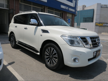 Nissan  Patrol  Platinum  2015  Automatic  141,000 Km  8 Cylinder  Four Wheel Drive (4WD)  SUV  White