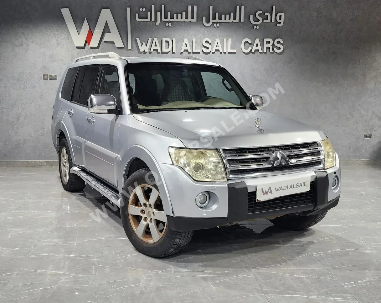 ميتسوبيشي باجيرو GLS 2008 اوتوماتيك 311,000 كم 6 سلندر دفع رباعي اس يو في فضي
