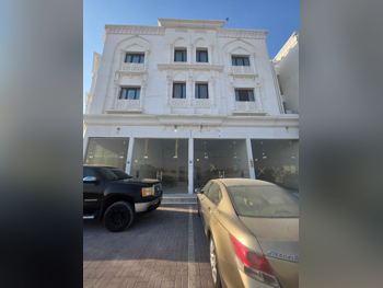 محلات تجارية - غير مفروشة - أم صلال للايجار
