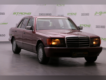 مرسيدس - بنز 380 اس اي ال 1989 اوتوماتيك 104,000 كم 6 سلندر دفع خلفي كلاسك عنابي
