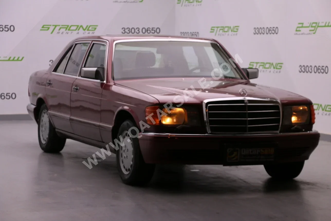 مرسيدس - بنز 380 اس اي ال 1989 اوتوماتيك 104,000 كم 6 سلندر دفع خلفي كلاسك عنابي