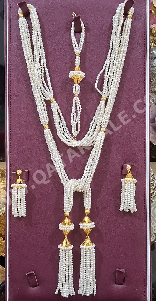 الذهب حسب القطعة ( ديزاينرز) طقم البحرين نسائي طبيعة 23.5 غرام ذهب أصفر عيار 21