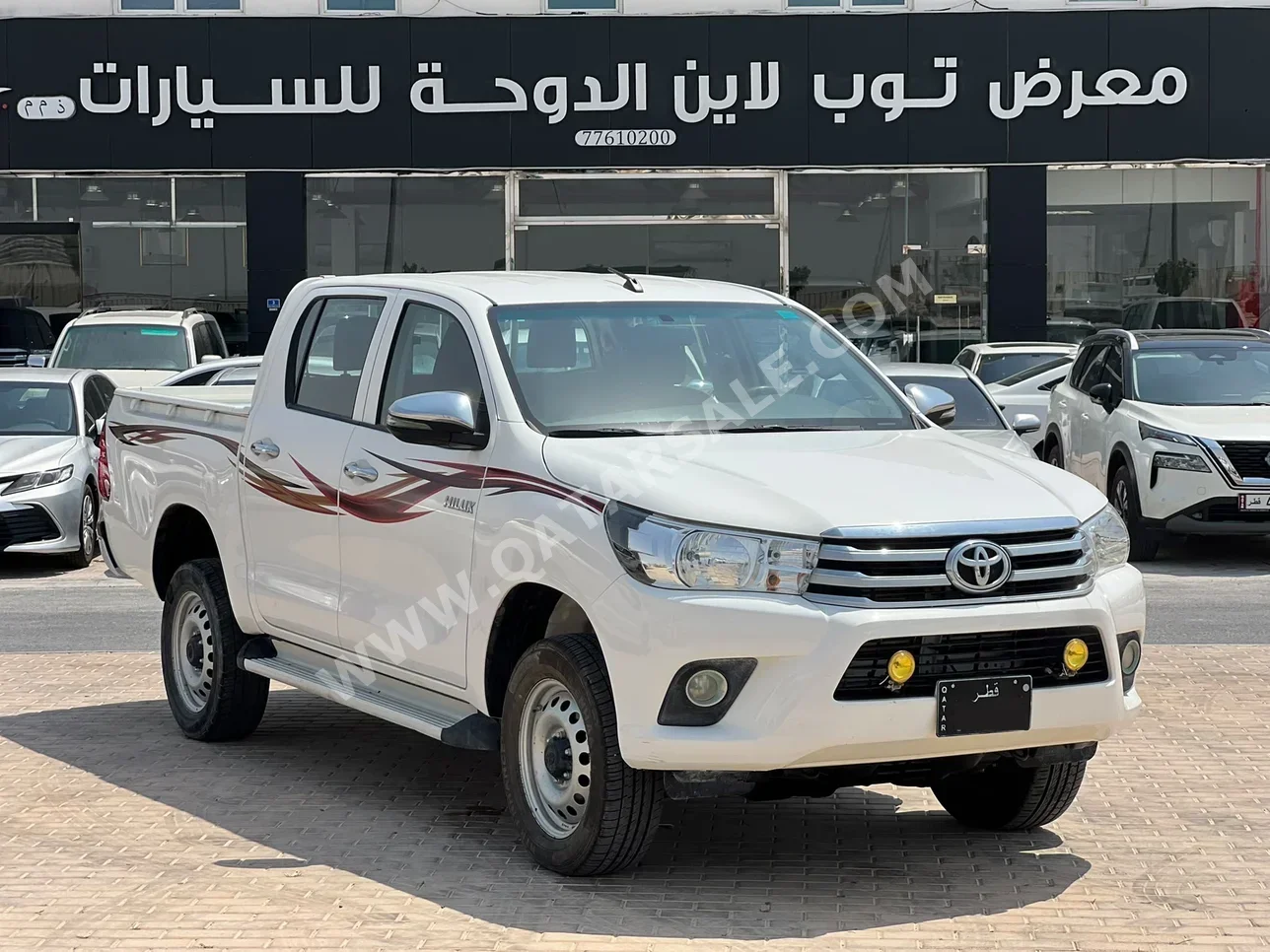 تويوتا هاي لوكس 2022 اوتوماتيك 82,000 كم 4 سلندر دفع رباعي بيكب أبيض