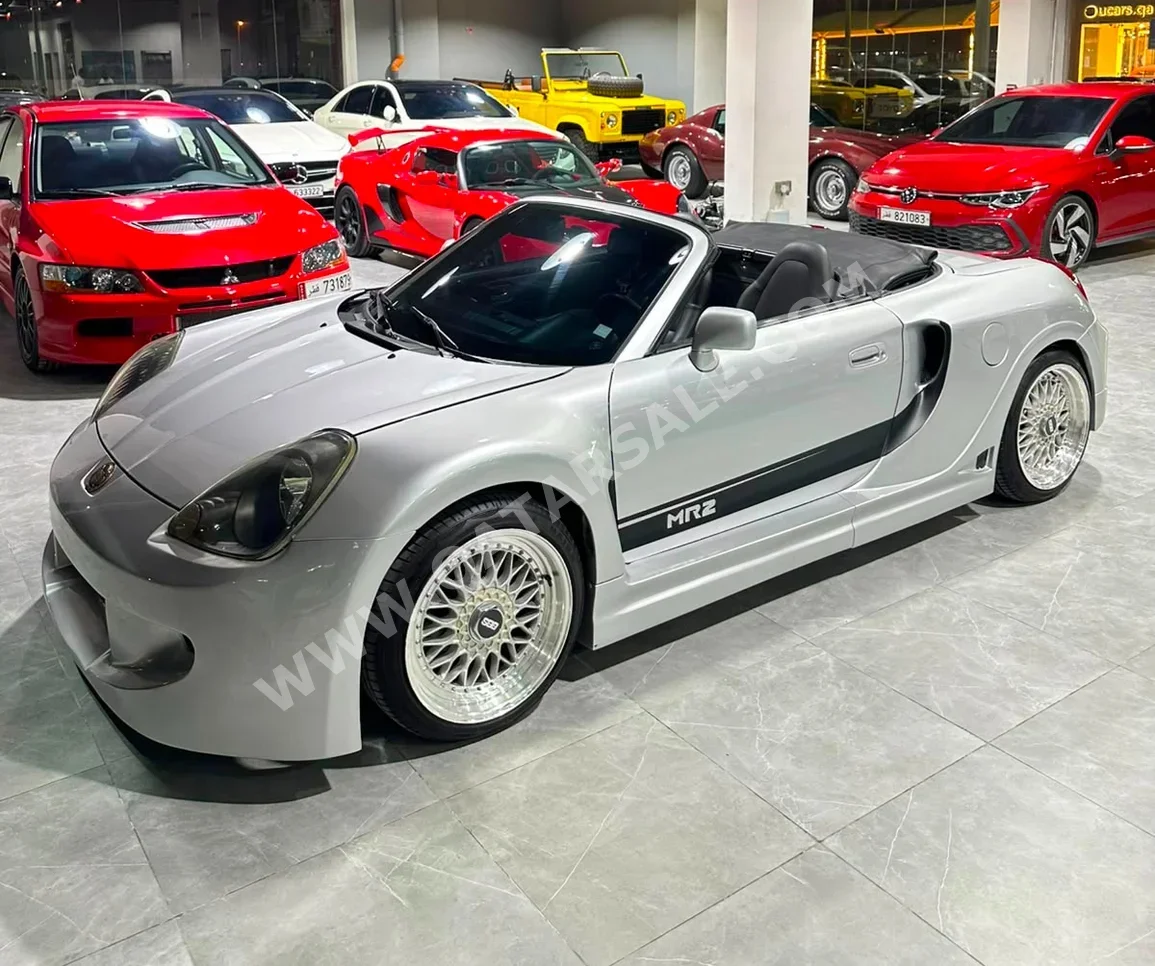 تويوتا ام آر 2 2002 عادي 99,000 كم 4 سلندر دفع خلفي كوبيه \ سبورت فضي