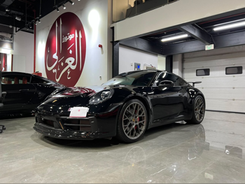 بورش  911  كاريرا  2022  اوتوماتيك  14,000 كم  6 سلندر  دفع خلفي  كوبيه \ سبورت  أسود