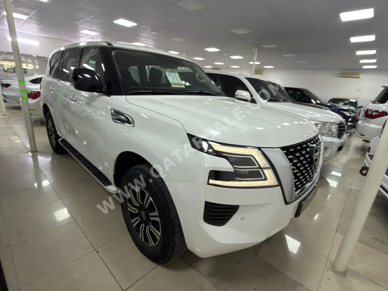 Nissan  Patrol  XE  2022  Automatic  80,000 Km  6 Cylinder  Four Wheel Drive (4WD)  SUV  White