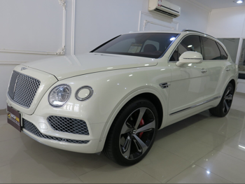 Bentley  Bentayga  2018  Automatic  65,000 Km  12 Cylinder  Four Wheel Drive (4WD)  SUV  White