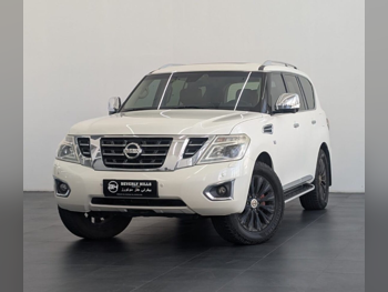 Nissan  Patrol  Platinum  2017  Automatic  121,240 Km  8 Cylinder  Four Wheel Drive (4WD)  SUV  White