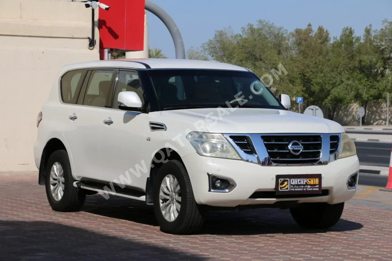 Nissan  Patrol  LE  2014  Automatic  266,000 Km  8 Cylinder  Four Wheel Drive (4WD)  SUV  White