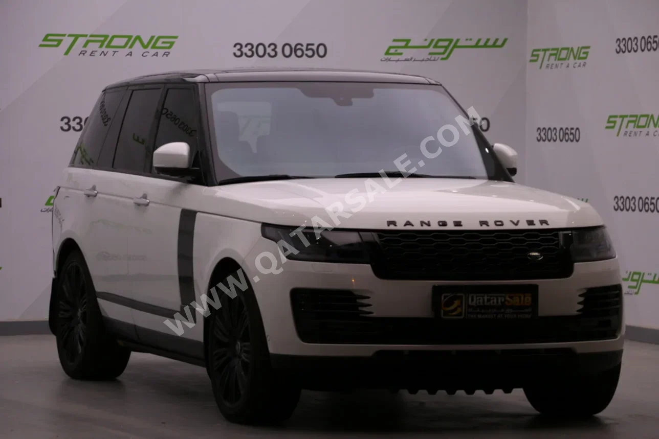 Land Rover  Range Rover  Vogue  Autobiography  2014  Automatic  99,000 Km  8 Cylinder  Four Wheel Drive (4WD)  SUV  White