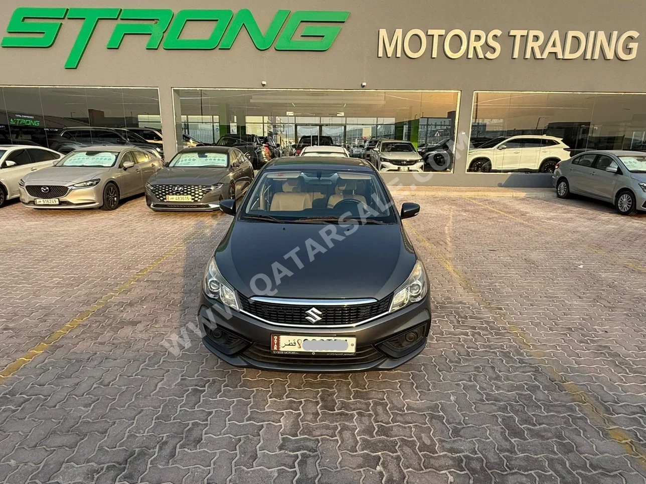 سوزوكي سياز 2023 اوتوماتيك 65,000 كم 4 سلندر سحب امامي سيدان رمادي