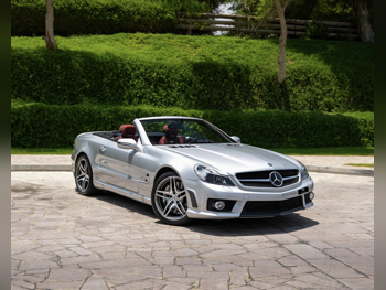 Mercedes-Benz  SL  63 AMG  2009  Automatic  44,000 Km  8 Cylinder  Rear Wheel Drive (RWD)  Convertible  Silver