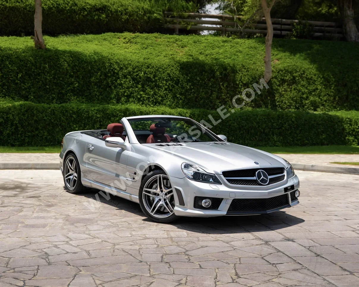 Mercedes-Benz  SL  63 AMG  2009  Automatic  44,000 Km  8 Cylinder  Rear Wheel Drive (RWD)  Convertible  Silver