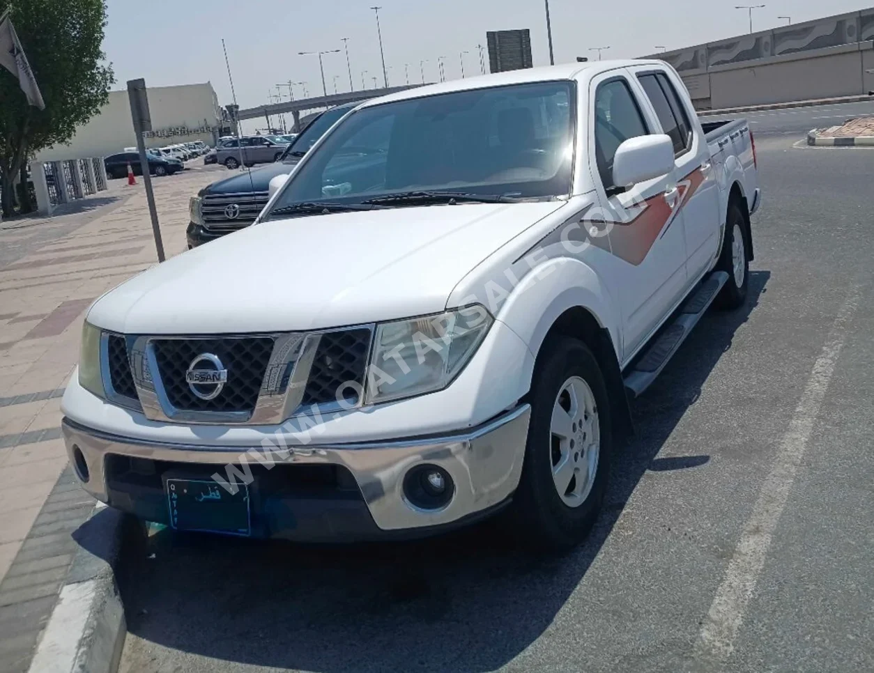Nissan Navara LE 2014 Manual 101,494 Km 4 Cylinder Rear Wheel Drive (RWD) Pick Up White