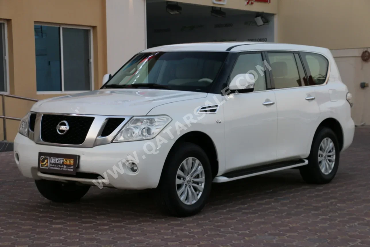 Nissan  Patrol  SE  2013  Automatic  379,000 Km  8 Cylinder  Four Wheel Drive (4WD)  SUV  White