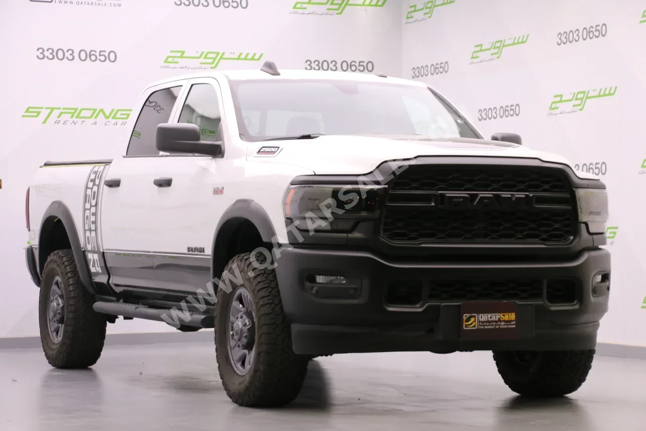 Dodge  Ram  2500  2021  Automatic  74,000 Km  8 Cylinder  Four Wheel Drive (4WD)  Pick Up  White