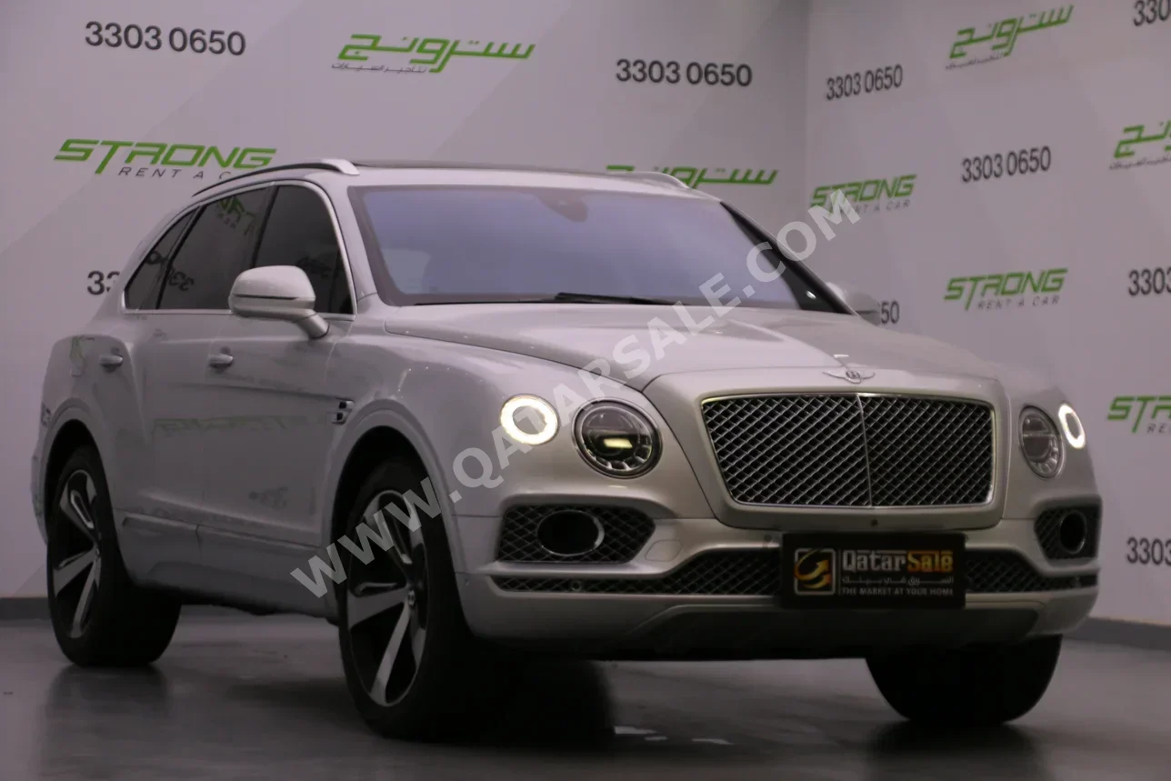 Bentley  Bentayga  2018  Automatic  103,000 Km  12 Cylinder  Four Wheel Drive (4WD)  SUV  Silver