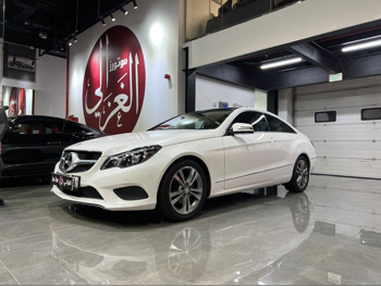 Mercedes-Benz  E-Class  200  2014  Automatic  37,000 Km  4 Cylinder  Rear Wheel Drive (RWD)  Coupe / Sport  White