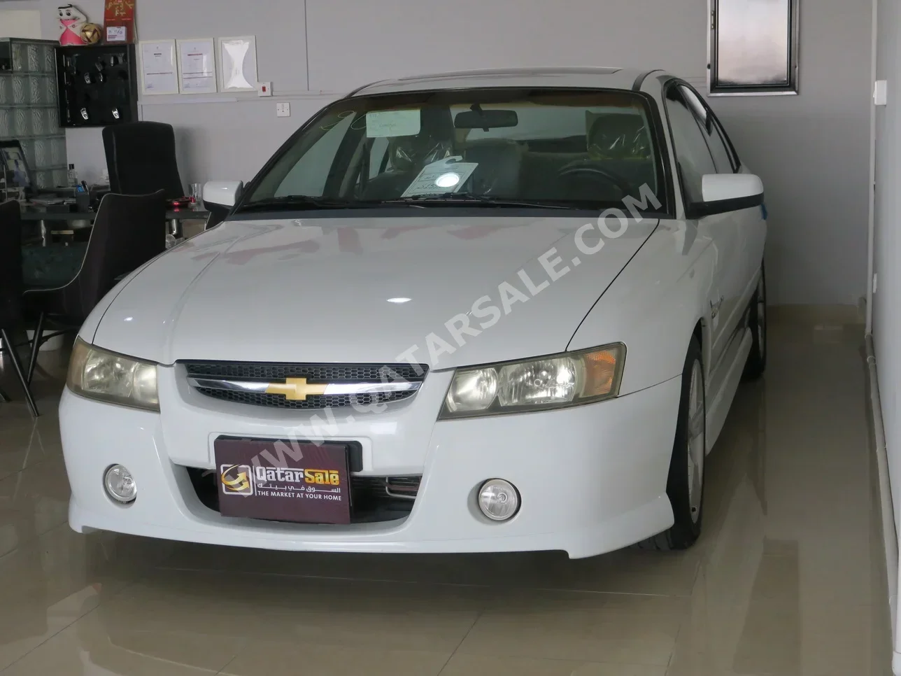 شفروليه اس اس 2006 اوتوماتيك 139,000 كم 8 سلندر دفع خلفي سيدان أبيض