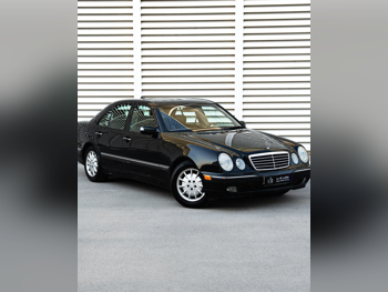 Mercedes-Benz  E-Class  240  2002  Automatic  154,000 Km  6 Cylinder  Rear Wheel Drive (RWD)  Sedan  Black