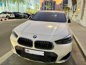 BMW  X-Series  X2  2021  Automatic  56,000 Km  4 Cylinder  All Wheel Drive (AWD)  SUV  White  With Warranty