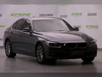 BMW 3-Series 318i 2018 Automatic 76,000 Km 3 Cylinder Rear Wheel Drive (RWD) Sedan Gray — image 1