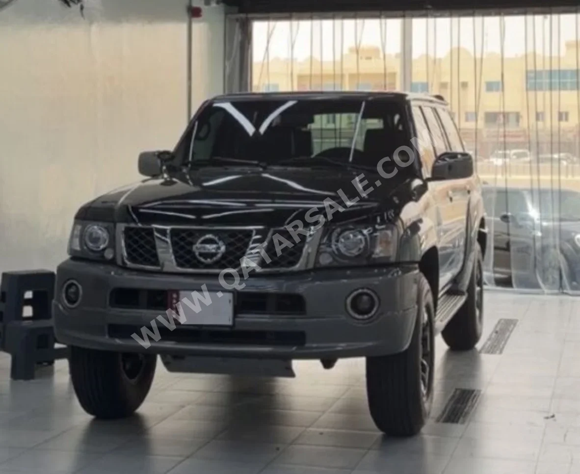 Nissan Patrol Super Safari 2022 Manual 83,000 Km 6 Cylinder Four Wheel Drive (4WD) SUV Black — image 1
