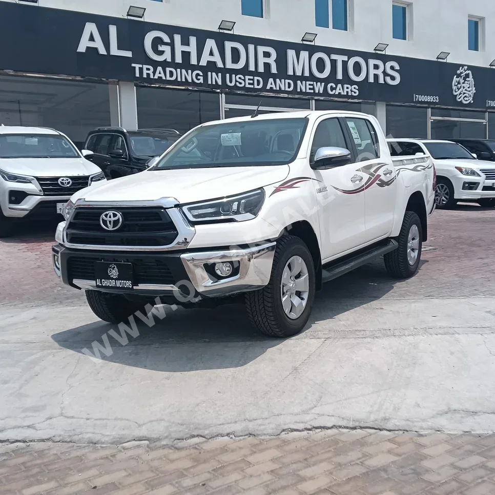 Toyota Hilux SR5 2025 Manual 0 Km 4 Cylinder Four Wheel Drive (4WD) Pick Up White With Warranty — image 1