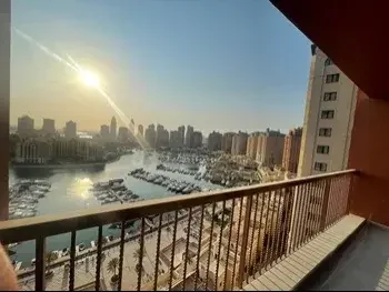 2 Bedrooms  Apartment  For Rent  in Doha -  The Pearl  Fully Furnished