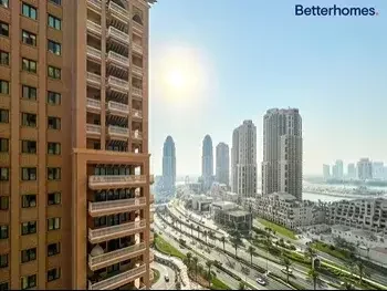 3 Bedrooms  Apartment  For Rent  in Doha -  The Pearl  Semi Furnished