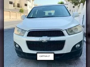 Chevrolet  Captiva  LT  2012  Automatic  90,200 Km  4 Cylinder  All Wheel Drive (AWD)  SUV  Pearl