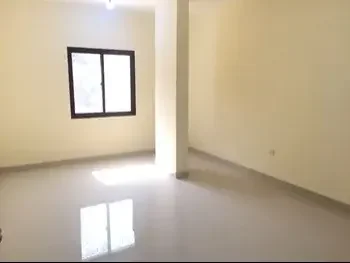 2 Bedrooms  Apartment  For Rent  in Doha -  Madinat Khalifa South  Not Furnished