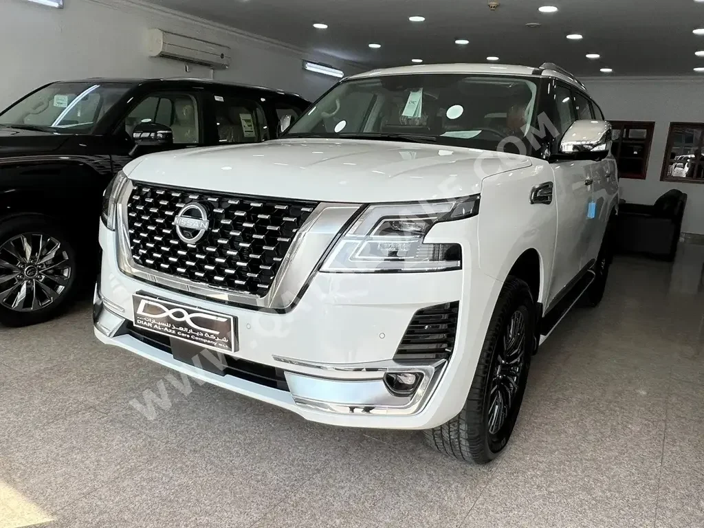 Nissan  Patrol  Platinum  2023  Automatic  0 Km  6 Cylinder  Four Wheel Drive (4WD)  SUV  White  With Warranty