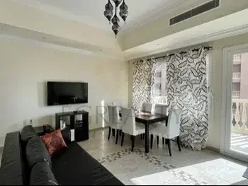 2 Bedrooms  Apartment  For Rent  in Doha -  The Pearl  Fully Furnished