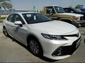 Toyota  Camry  LE  2023  Automatic  0 Km  4 Cylinder  Front Wheel Drive (FWD)  Sedan  White  With Warranty