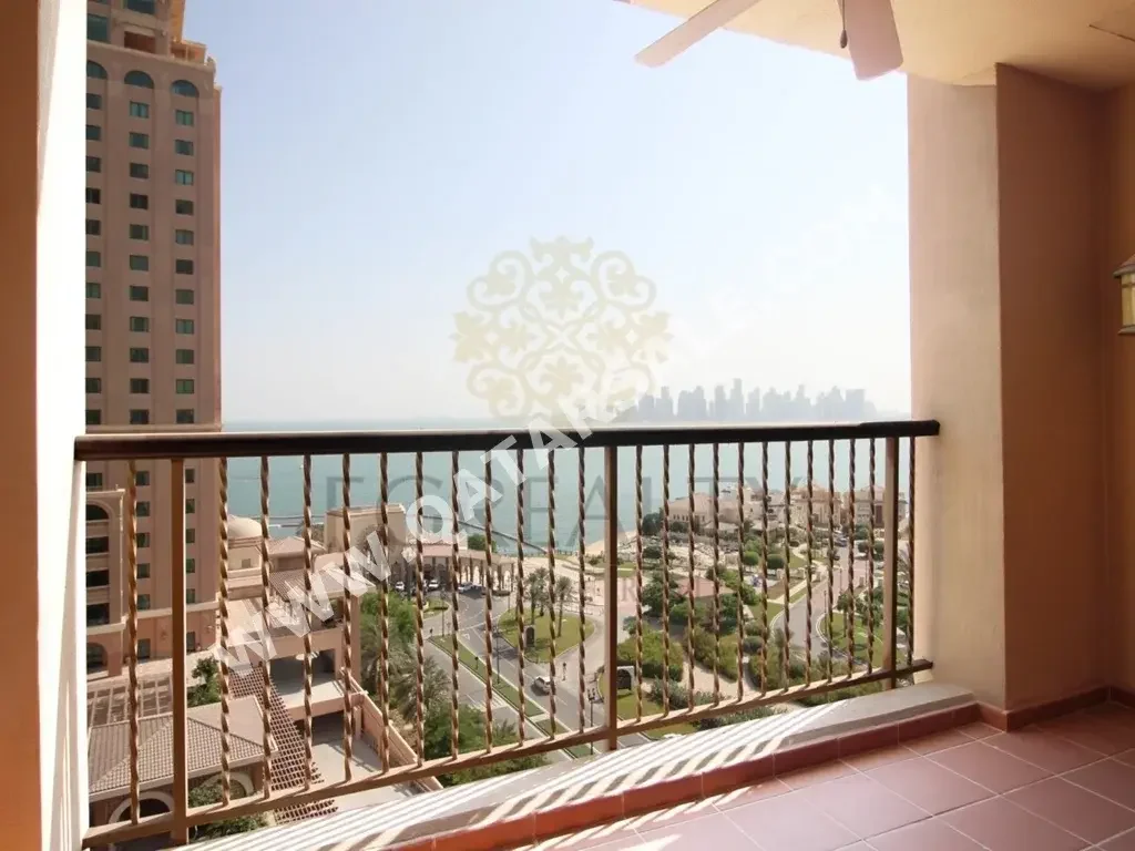 2 Bedrooms  Apartment  For Rent  in Doha -  The Pearl  Semi Furnished