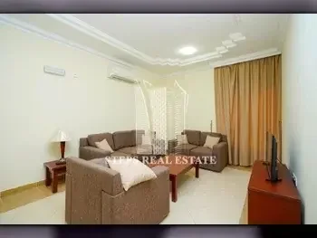 2 Bedrooms  Apartment  For Rent  in Doha -  Al Mansoura  Fully Furnished