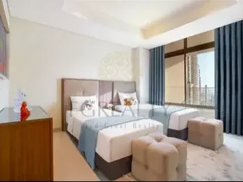 2 Bedrooms  Apartment  For Rent  in Doha -  The Pearl  Fully Furnished