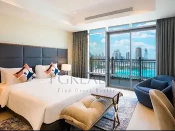 2 Bedrooms  Apartment  For Rent  in Doha -  The Pearl  Fully Furnished