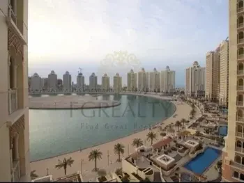 2 Bedrooms  Apartment  For Rent  in Doha -  The Pearl  Not Furnished