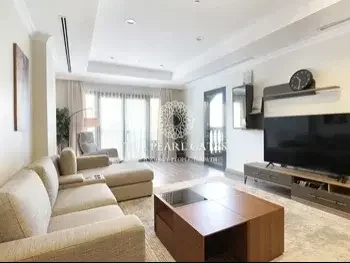 2 Bedrooms  Apartment  For Rent  in Doha -  The Pearl  Fully Furnished