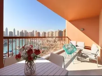 2 Bedrooms  Apartment  For Rent  in Doha -  The Pearl  Fully Furnished