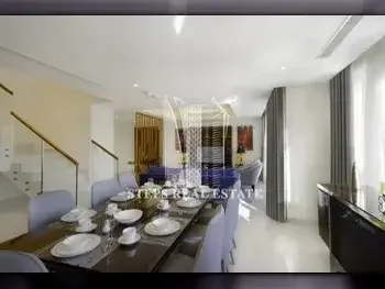 2 Bedrooms  Apartment  For Rent  in Doha -  The Pearl  Fully Furnished