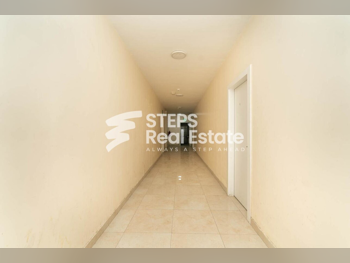 سكن عمال، أم صلال، المزروعة