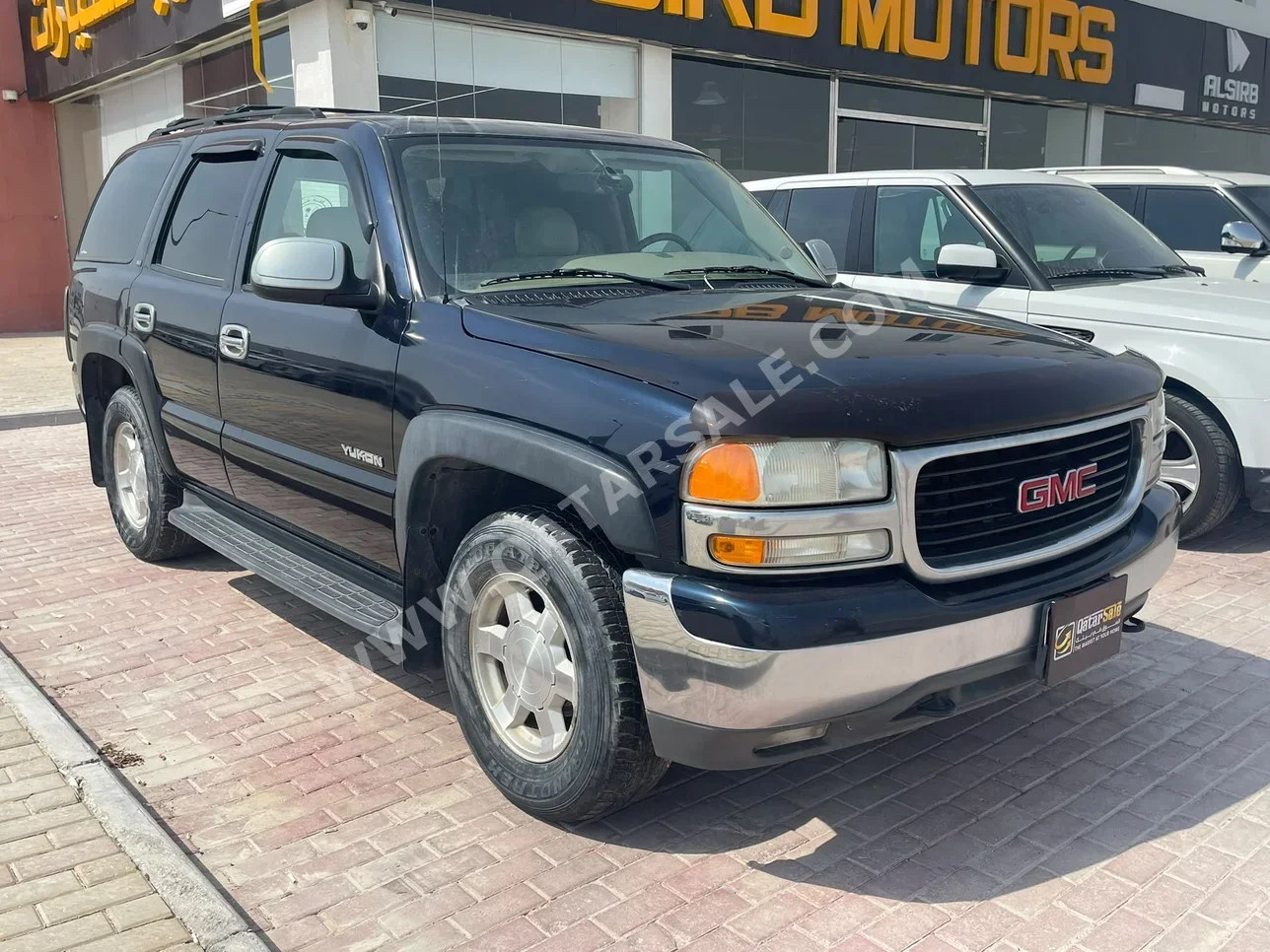 Slt Report GMC Yukon SLT Black 2005 For Sale in Qatar