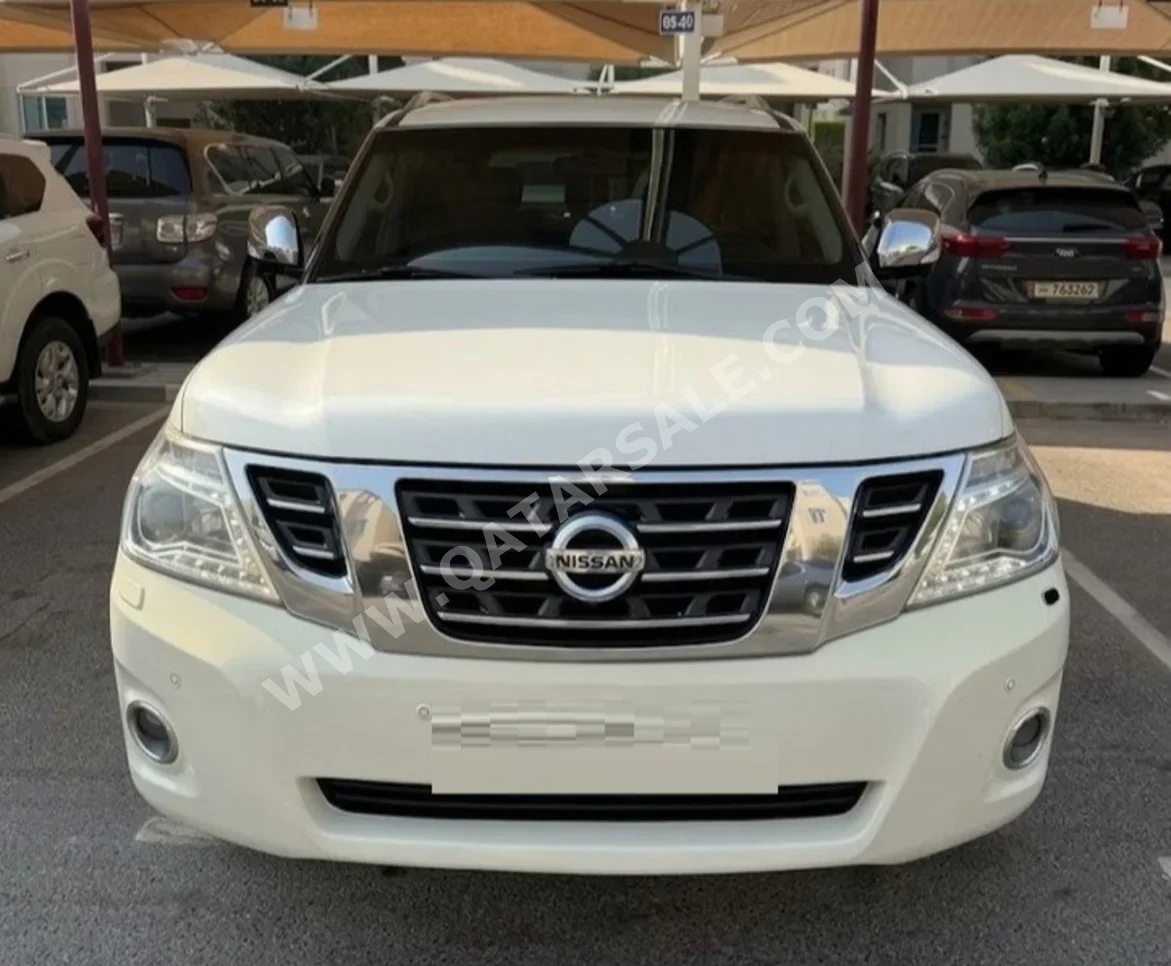 Patrol Musical Instruments Nissan Patrol Platinum White 2016 For Sale in Qatar