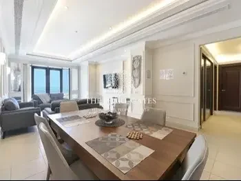 2 Bedrooms  Apartment  For Rent  in Doha -  The Pearl  Fully Furnished