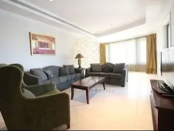 2 Bedrooms  Apartment  For Rent  in Doha -  The Pearl  Fully Furnished