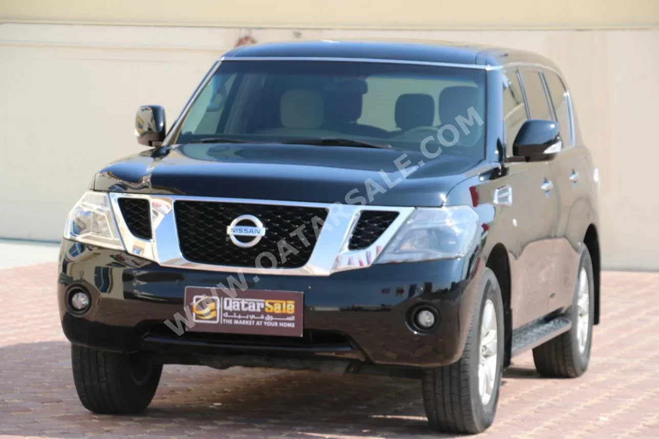 Patrol Musical Instruments Nissan Patrol SE Black 2013 For Sale in Qatar